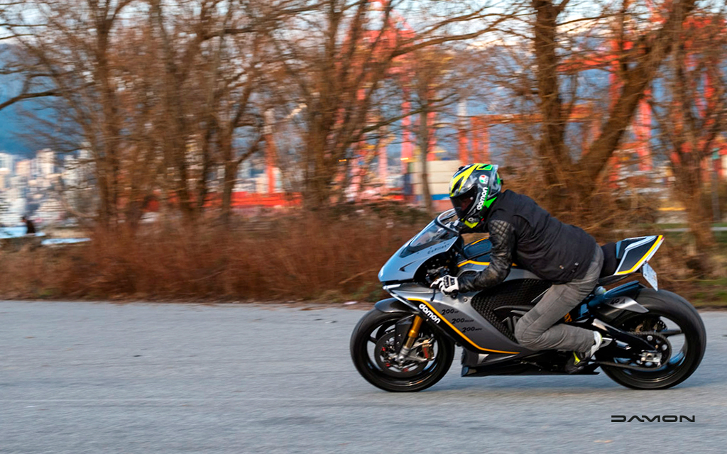 rider on damon hypersport premier prototype leaning into a corner