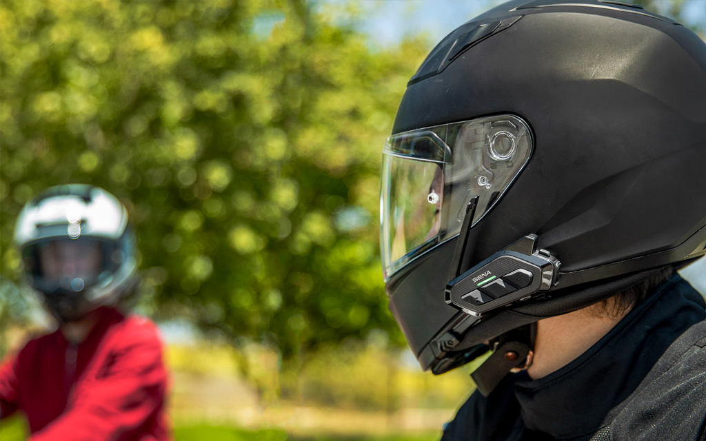 black helmet with sena spider bluetooth headset